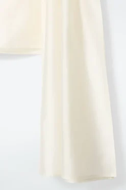New COS ASYMMETRIC BROOCH-DETAIL BLOUSE IVORY
