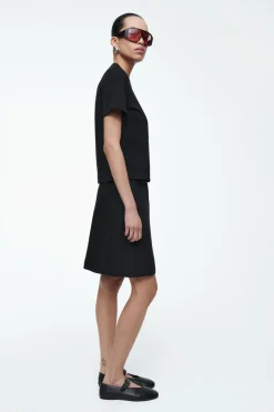 Outlet COS FRONT-PLEAT MINI SKIRT BLACK