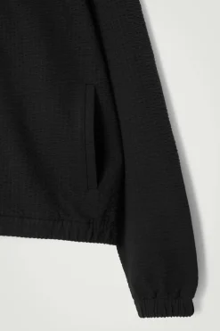 Outlet COS RIBBED JERSEY ZIP-UP HOODIE BLACK