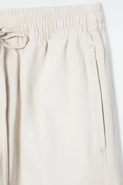 Online COS WIDE-LEG FLUID DENIM PANTS ECRU